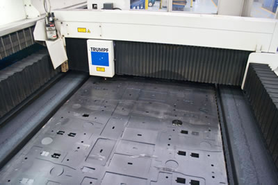 Laser Cutting Machine & Cut Parts